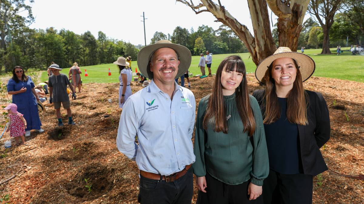 Greg Fikkers, Tamryn Bennett and Felicity Skoberne at William Beach Reserve in Brownsville for the announcement of the local Poem Forest competition winners.