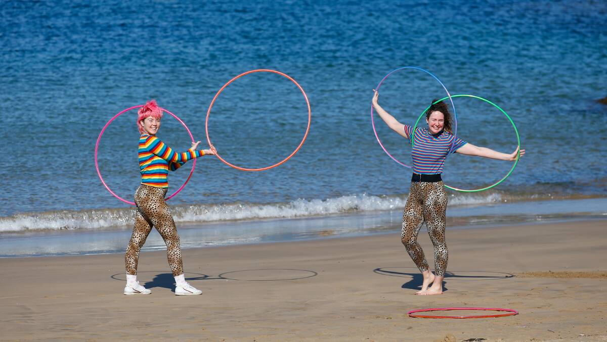 Bianca Pentecost and Lauren Greer performing some hula hoop tricks at Belmore Basin in Wollongong on September 4, 2023. Picture by Anna Warr