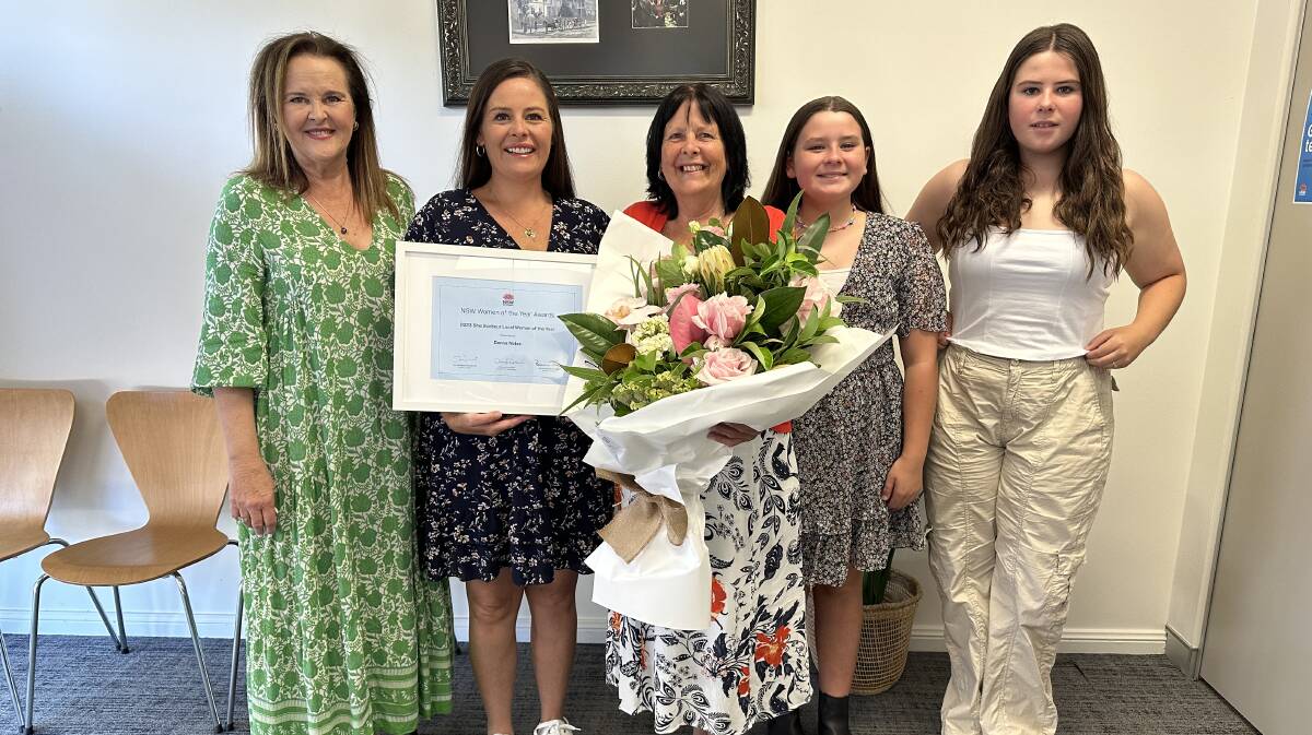 Ms Nelse and Anna Watson MP with Ms Nelses daughter and granddaughters at the award presentation. Picture supplied by Office of Anna Watson MP.