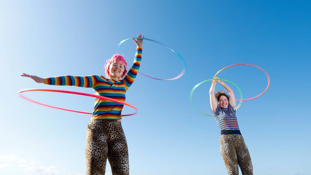 Bianca Pentecost and Lauren Greer performing some hula hoop tricks at Belmore Basin in Wollongong on September 4, 2023. Picture by Anna Warr