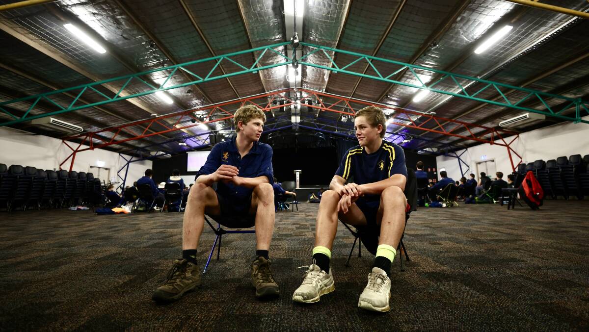 Scots College Year 9 students Darcy Spellson and Oscar Tremlett at the Stanwell Tops Conference Centre and camp grounds on November 29, 2023 during their 200km trek from Kangaroo Valley to Sydney. Picture by Adam McLean