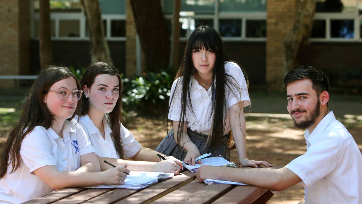 Keira High School students Molly Rouse, Ali Taskin, Lilian Suri and Ellie Iskra prepare for their HSC exams together. Picture By Sylvia Liber