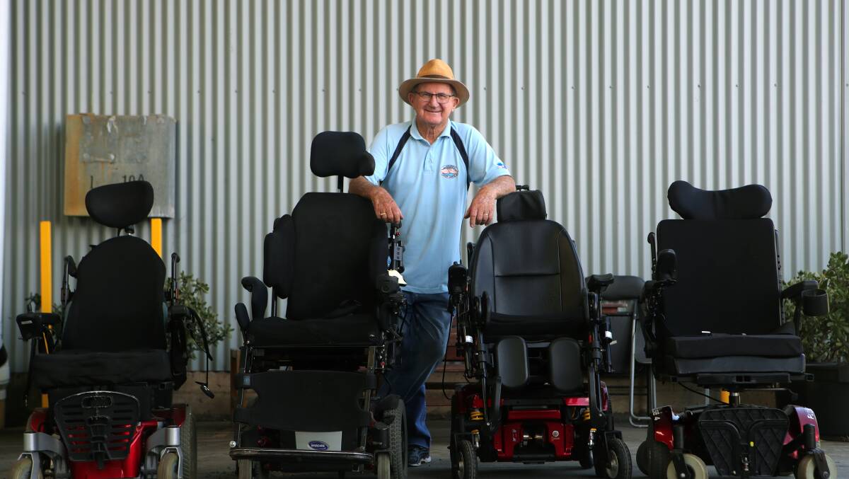Keith Wilson, co-ordinator of mobility equipment at Cancer Carers standing with repaired mobility scooters that the group are looking to give to cancer patients. Picture by Sylvia Liber.