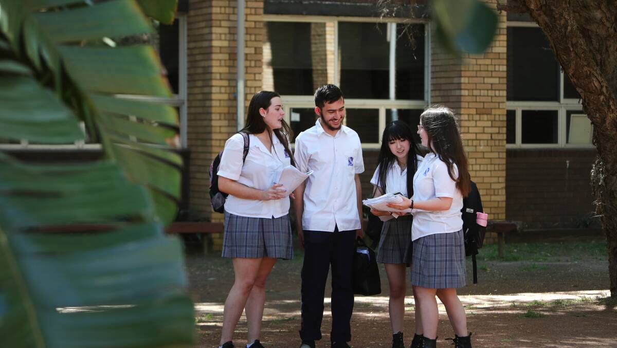 Year 12 Keira High School students Molly Rouse, Ali Taskin, Lilian Suri and Ellie Iskra, catching up on studying ahead of their exams . Picture by Sylvia Liber