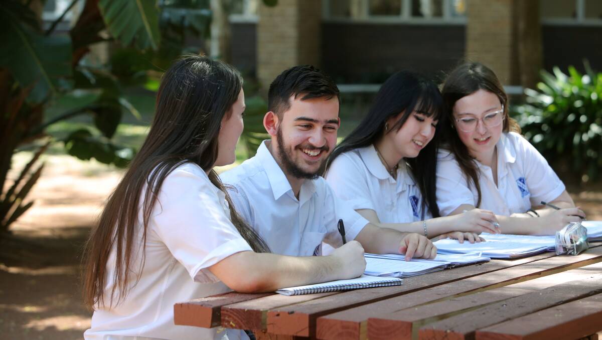 Keira High School students Molly Rouse, Ali Taskin, Lilian Suri and Ellie Iskra prepare for their HSC exams together. Picture By Sylvia Liber