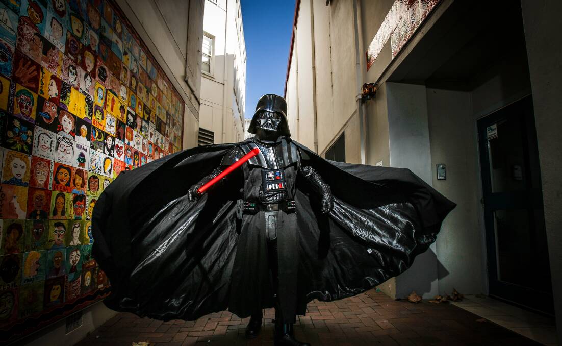 Jason Zimmerman dressed as Darth Vader at the arts precint ahead of Comic Gong 2017. Picture by Adam McLean.
