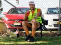 Lunch - on the run. Tim Franklin outside Wollongong Golf Course on Thursday. Picture by Anna Warr