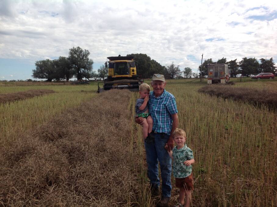 Ken Male at Henty with his grandsons Rueben and Douglas, is looking forward to many more harvests once this his 68th is completed.
