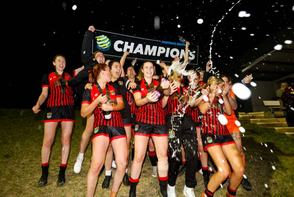 September 3. Shellharbour players celebrate their win in the Women's Illawarra Premier League grand final against Woonona at Ian Mc Lennan Park, Kembla Grange.