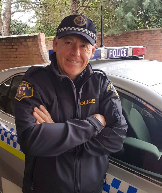 GENEROUS: Constable Dave Simpson has been identified as the police officer photographed buying a homeless man a coffee and lunch in Launceston this week.  