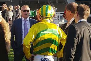 Pre-race: Tim Martin with connections in the birdcage at Randwick. Picture martinracing.com.au