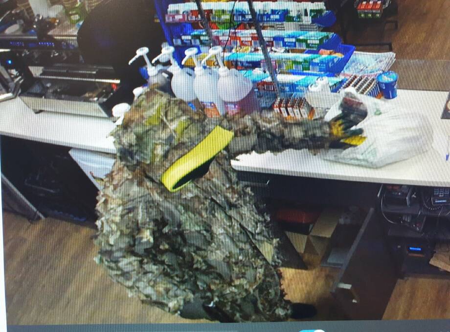 Police say a man wearing this suit robbed a Mogo service station on Wednesday, September 11.