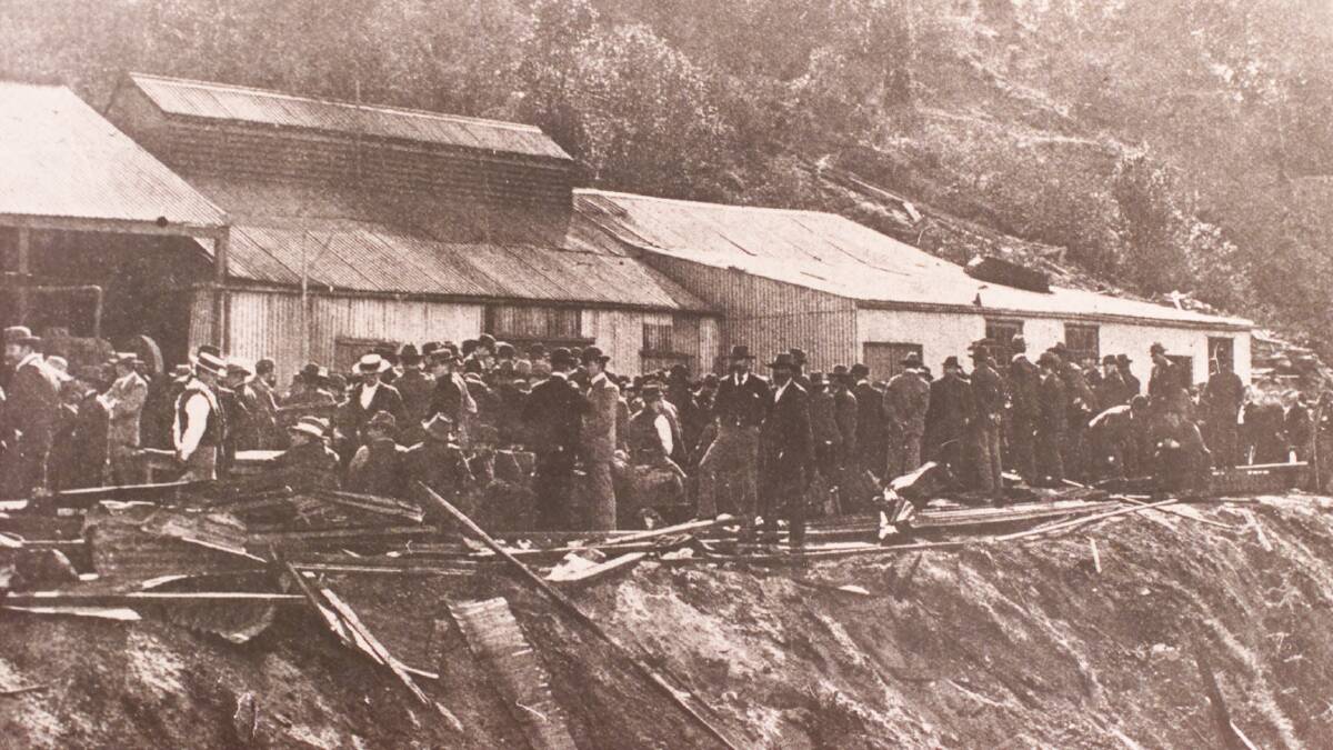 Miners congregate at the pit head after the explosion. File picture