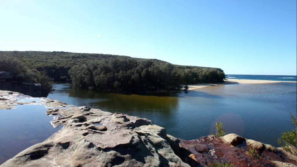 Police have urged people to heed the warning signs at Wattamolla after a man drowned on Thursday night. Picture: Chris Lane