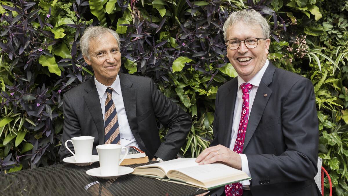 UOW Vice-Chancellor Paul Wellings (right) with Ramsay Centre CEO Simon Haines in December.
