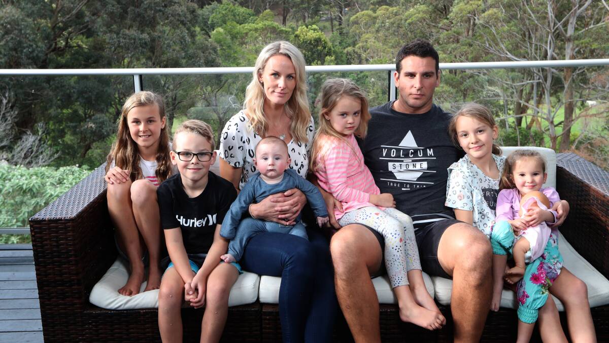 Michelle and Ryan Powell with Slater and their children. Picture: Sylvia Liber