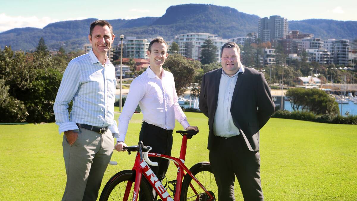Destination Wollongong major events manager Jeremy Wilshire, Cycling Australia general manager - sport Kipp Kaufmann and Illawarra Mercury editor Julian O'Brien launched the Take Wollongong To The World Logo Competition on Wednesday. Picture: Sylvia Liber