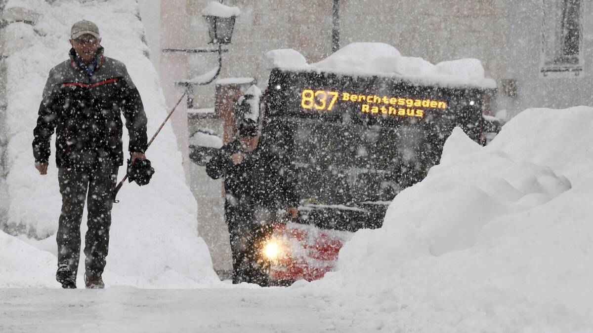 Large parts of southern Germany and Austria have been paralysed by heavy snow. Picture: AP