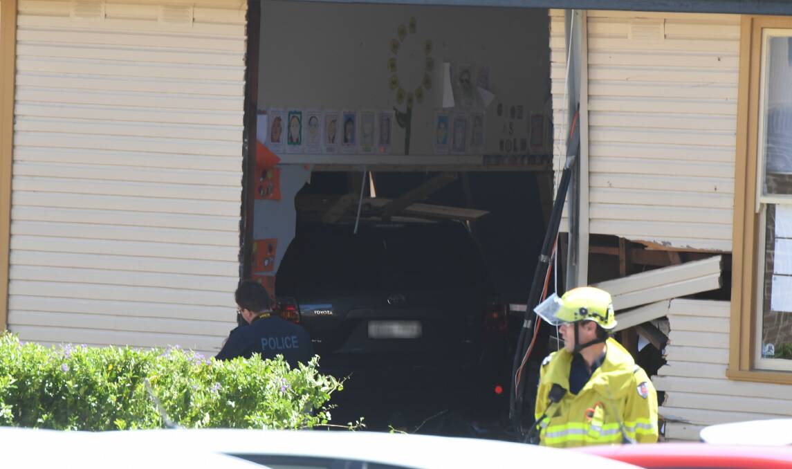 Nine children were injured, two critically, after a car smashed into a primary school classroom. Photo: AAP