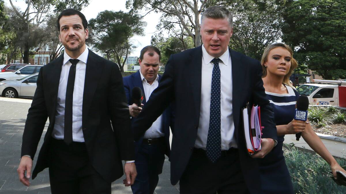 Jarrod Mullen (far left) entering Wollongong court on Wednesday. Picture: Sylvia Liber