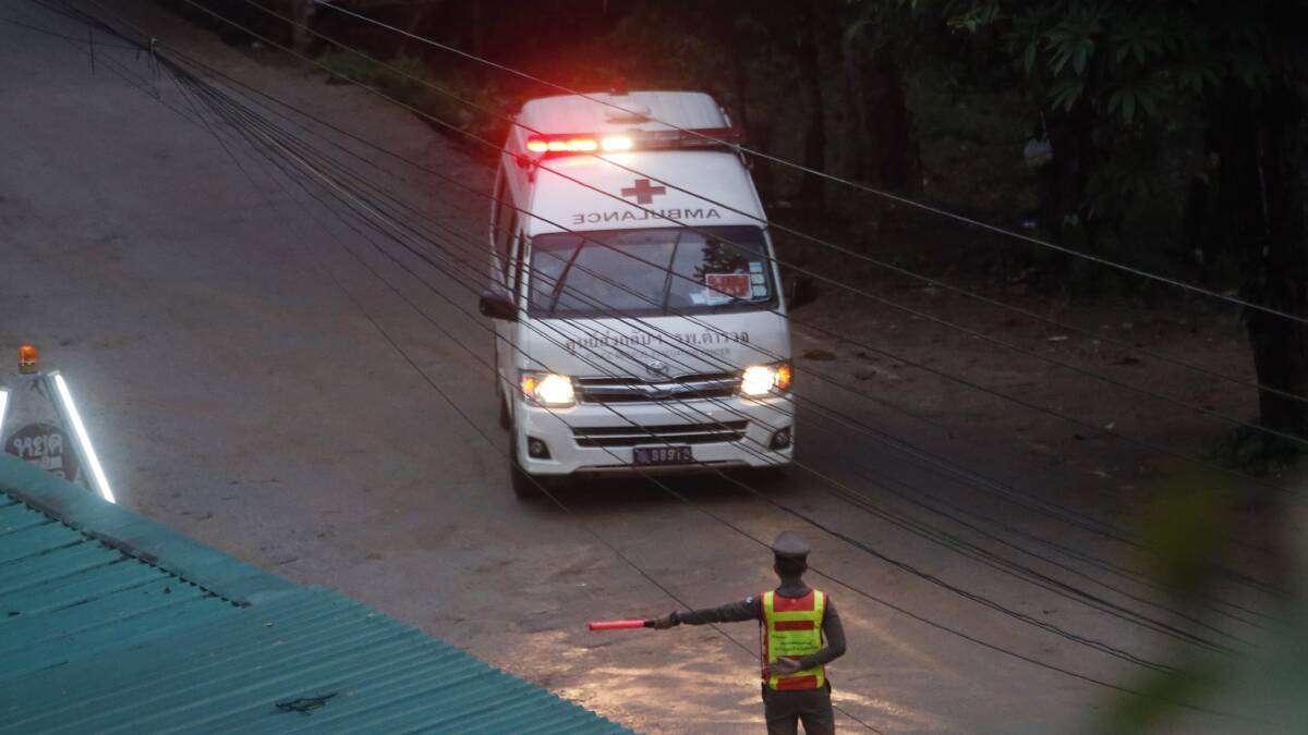 One of two ambulances leave the cave in northern Thailand. Picture: AP