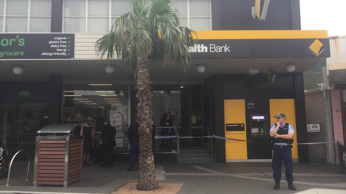 Manhunt underway after armed holdup at Thirroul bank