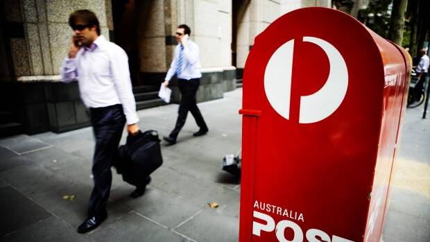 Australia Post's well-paid executives won't have to answer to angry customers who've just been told they have to pay for a package they know the sender already paid for. Photo: Jessica Shapiro