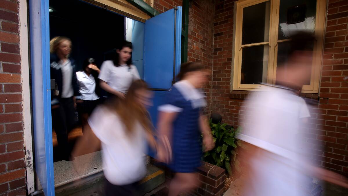 HSC students leaving the exam hall at Corrimal High School. Picture: Robert Peet