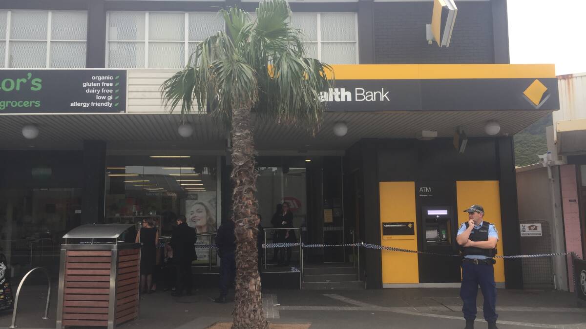 An armed robber held up the Commonwealth Bank at Thirroul on Friday. Picture: Robert Peet