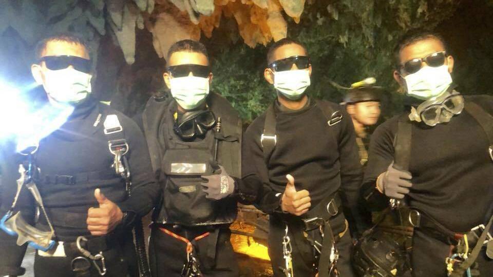Three Thai Navy SEALs and a Thai doctor stayed with the boys overnight and were the last people out of the cave. Picture: Thai Nave SEALs, Facebook