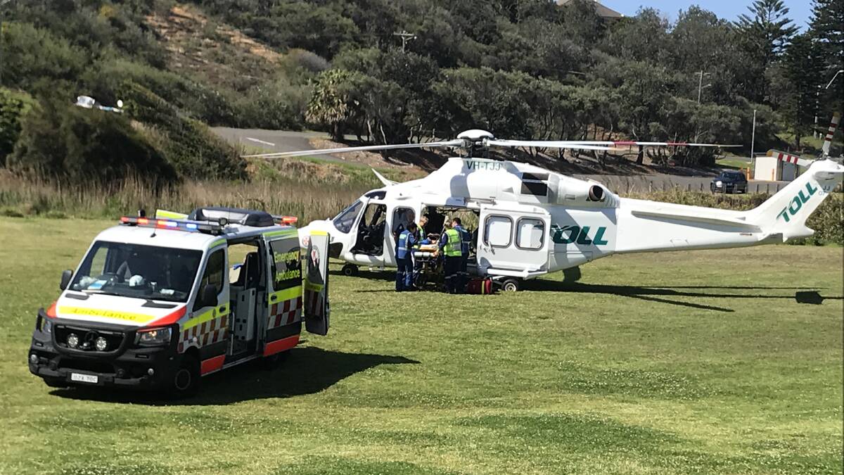 Driver trapped after truck rollover at Stanwell Park