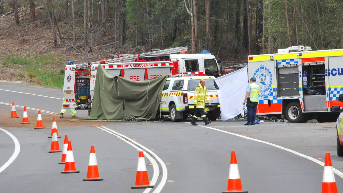 Investigators asses the scene of a deadly crash between two vehicles at Bendalong, near Sussex Inlet on Tuesday. Picture: Hayley Warden