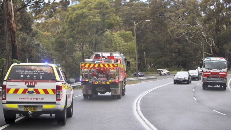 Emergency services are working to clean up the oil spill on Friday afternoon. Picture: Adam McLean