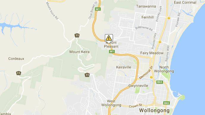 Mount Ousley Road closed after truck rollover