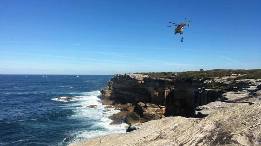 A helicopter retrieves the man's body at Kurnell. Picture: Blissiplined with Sara Shivani/Facebook