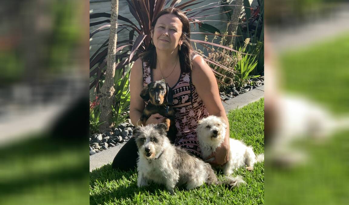 INCIDENT: Amanda Hickey at her Shell Cove home with family dogs Banjo, Koda and Bentley on Tuesday. Picture: Brendan Crabb 