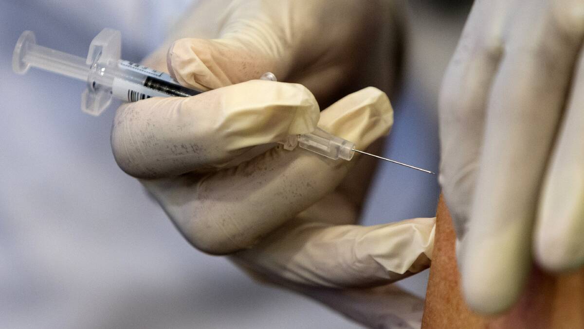 Parents whose children don't meet immunisation requirements will have their welfare payments docked. Picture: AP