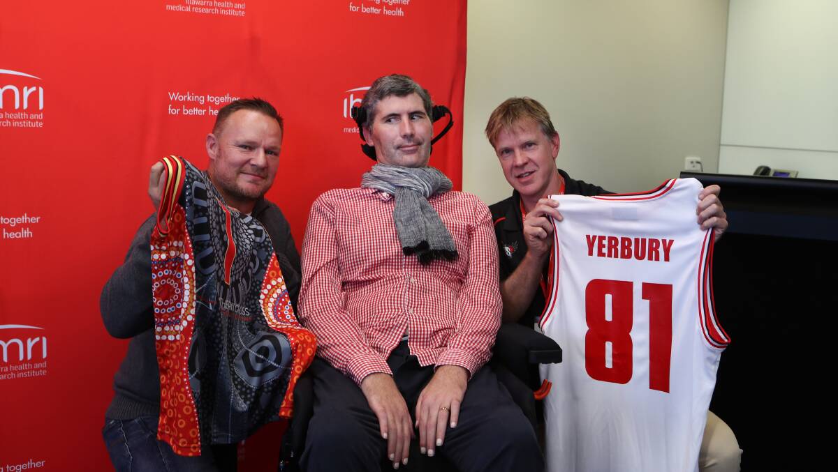 Professor Justin Yerbury (centre) with Illawarra Hawks owner Simon Stratford and coach Matt Flinn. Picture: Sylvia Liber