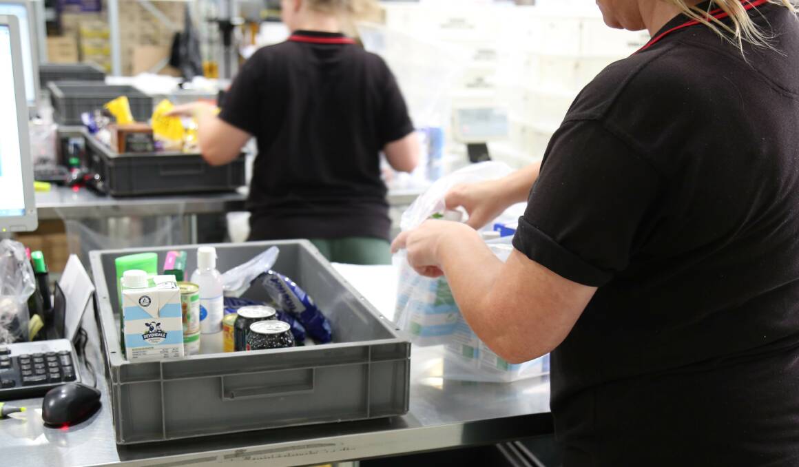 Inmate packing buy-ups . Photo courtesy CSNSW