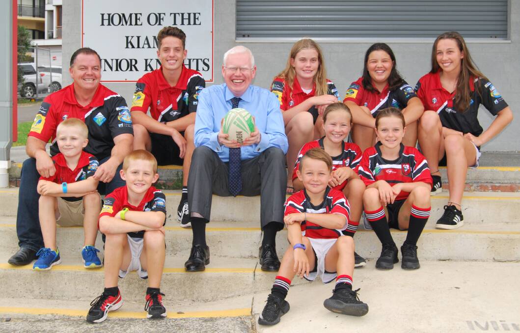 Kiama MP Gareth Ward is joined by Kiama Knights Junior Rugby League Football Club president Carl Middleton and players to promote the NSW Government’s Active Kids $100 sporting rebate.