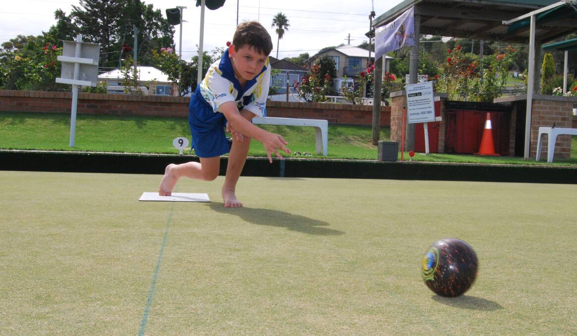 YOUNG GUN: Jacob Aitken, 11, is taking the Kiama Bowling Club greens by storm. Photo: HAYLEY WARDEN.
