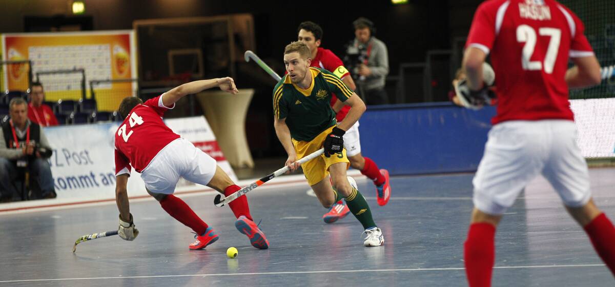 Kurt Ogilvie goes on the attack for Australia at the 2015 Indoor World Cup. Photo: Andrew Spence