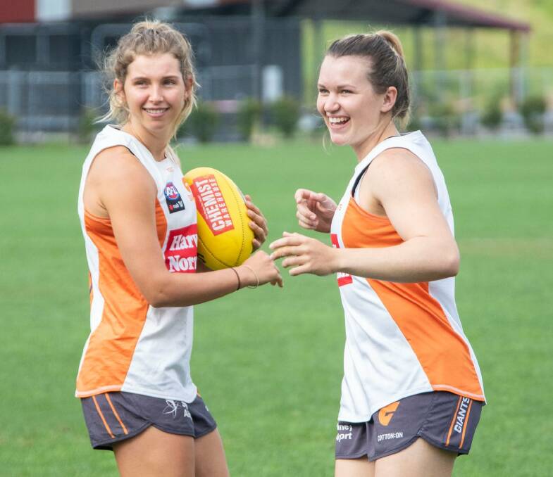 Maddy Collier (left) trains with the GWS Giants during the pre-season. Photo: Ryan Miller - GIANTS Media