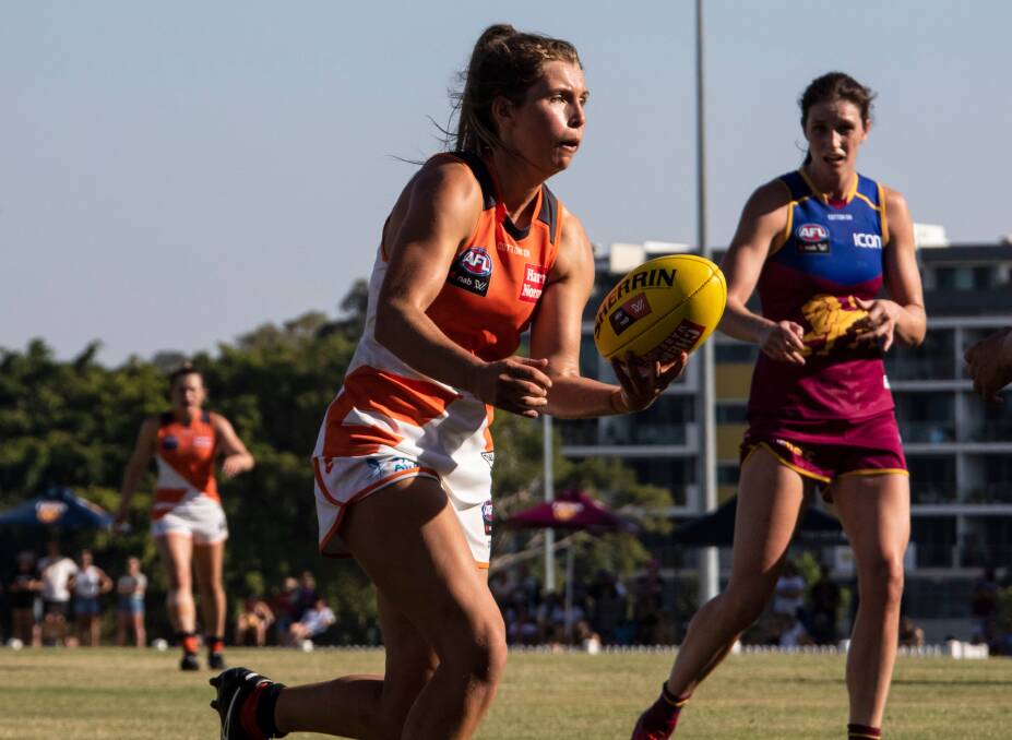 Hands off: Maddy Collier looks for a handball during the Giants practice match with the Brisbane Lions. Picture: Ryan Miller/GIANTS Media