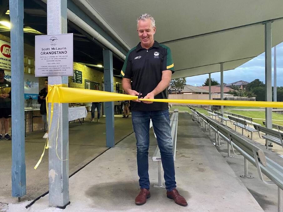 Stingrays of Shellharbour's Scott McLaurin cuts the tape on his new grandstand. Photo: Supplied
