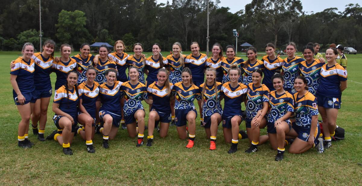 The two women's sides after the match on Saturday. Photo: COURTNEY WARD