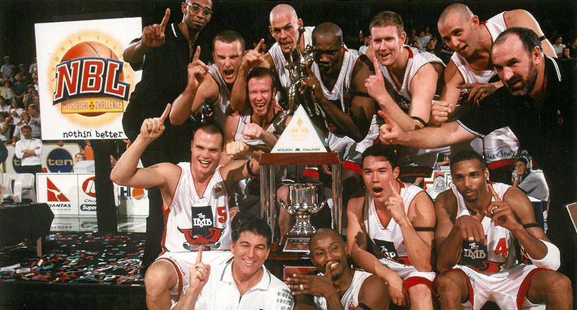 Eric Cooks (top left) and the 2001 championship winning Hawks side. Photo: NBL Media