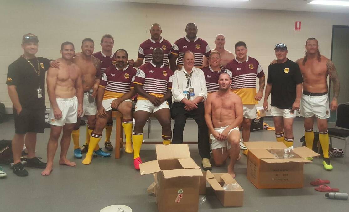 Wayne Bennett (white shirt) and the Brisbane Broncos Legends of League side, including Ashton Sims (far right). Photo: SUPPLIED