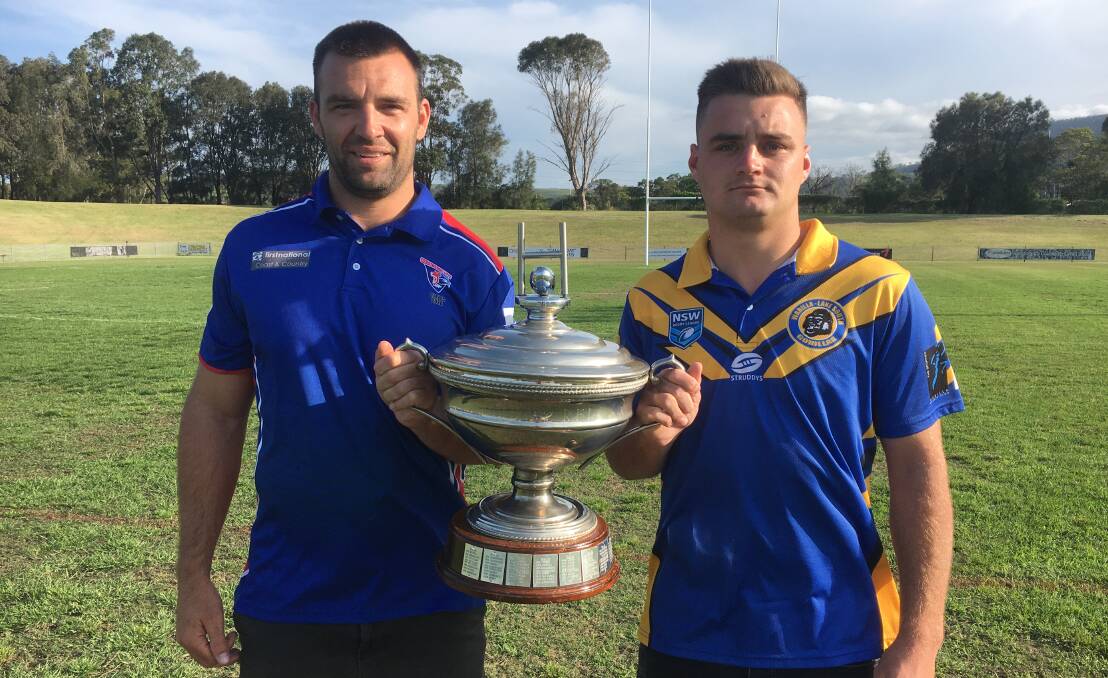 Gerringong's Nathan Ford and Warilla-Lake South's Blair Grant with the Artie Smith Trophy at Centenary Field. Photo: Courtney Ward