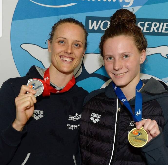 Ellie Cole and Jasmine Greenwood with their women's 100 metre freestyle multi-class medals. Photo: SWIMMING AUSTRALIA